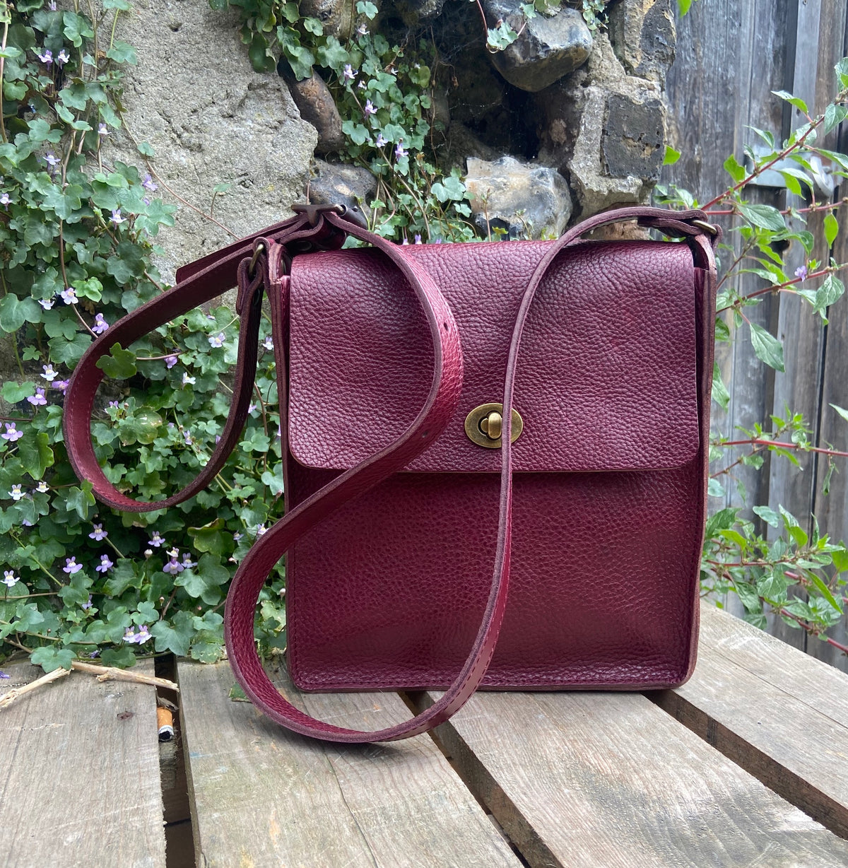 Flora Box crossbody in burgundy veg tan leather