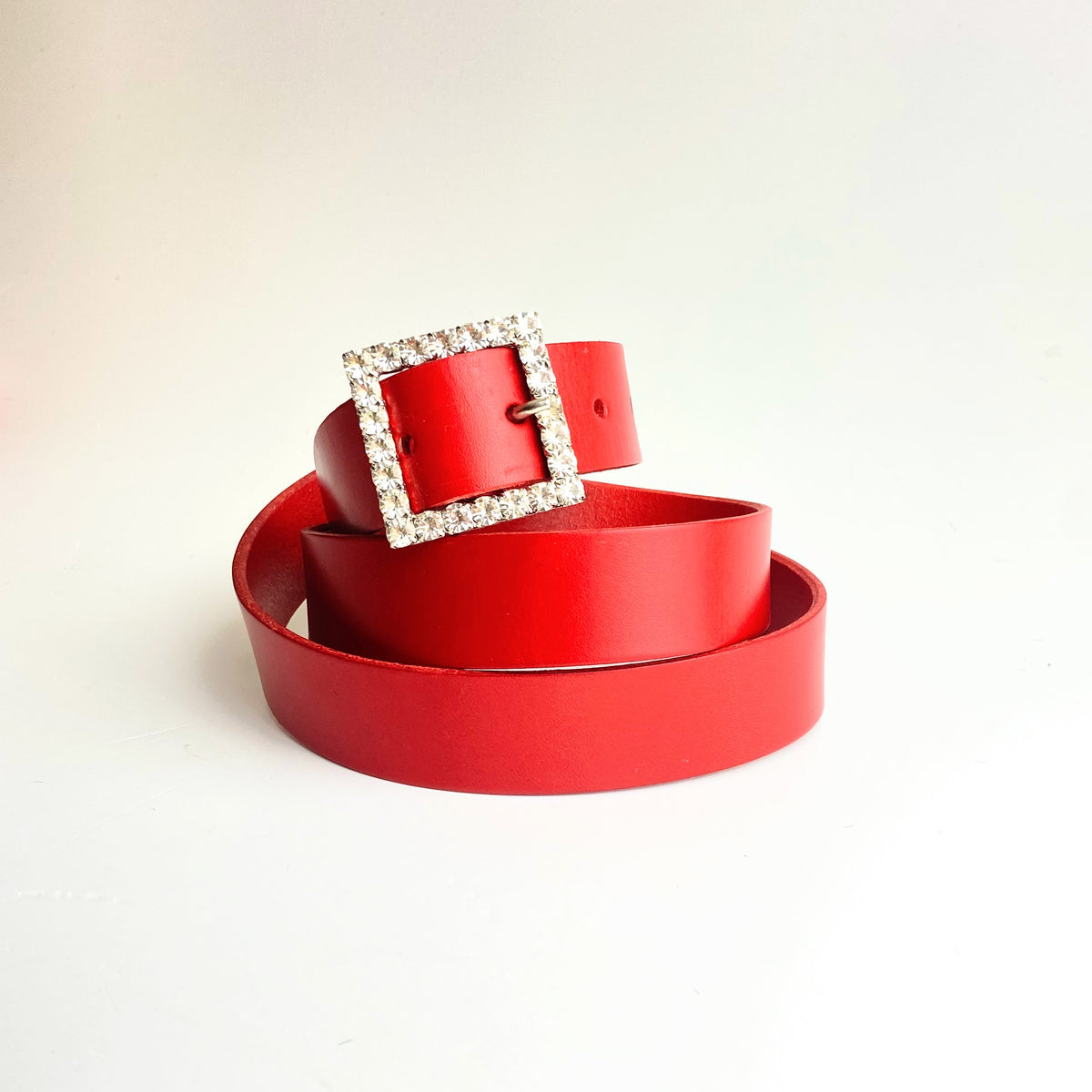 Saddlery hide belt in red with diamante buckle