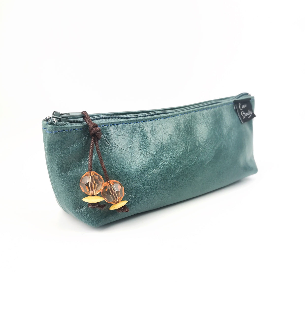 Pencil case in teal leather